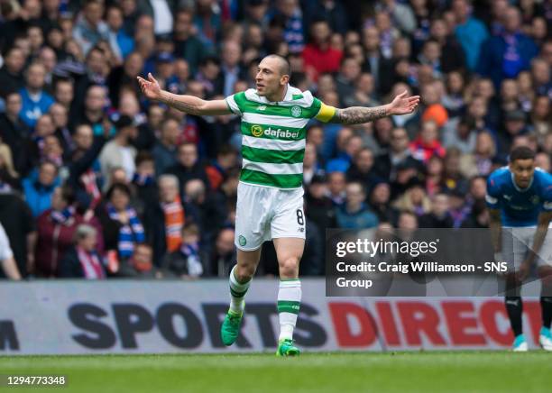 V CELTIC .IBROX - GLASGOW .Celtic's Scott Brown celebrates the second goal in front of the Rangers fans