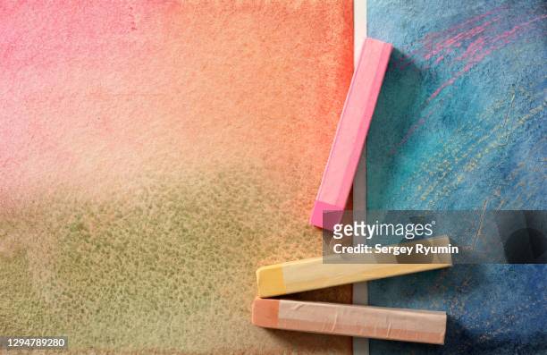 pastel crayons on watercolor background - pastel crayon stock pictures, royalty-free photos & images