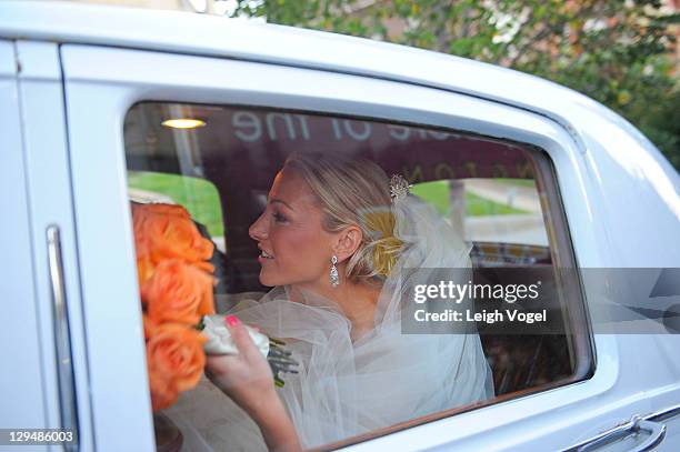 Lindsay Czarniak leaves the Church of the Holy City after her wedding on October 15, 2011 in Washington, DC.