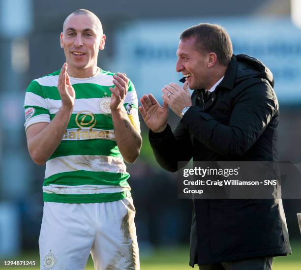 V CELTIC.GLOBAL ENERGY STADIUM - DINGWALL.Celtic manager Brendan Rodgers with Scott Brown