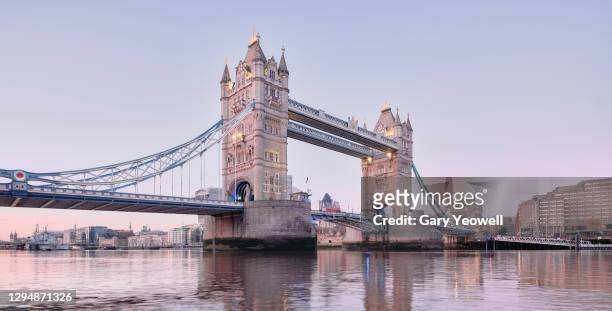 tower bridge and london city skyline at sunrise - central london stock pictures, royalty-free photos & images