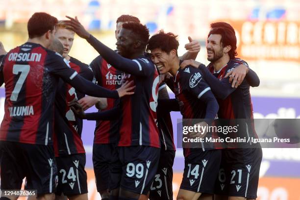 Takehiro Tomiyasu of Bologna FC celebrates after scoring the opening goal during the Serie A match between Bologna FC and Udinese Calcio at Stadio...