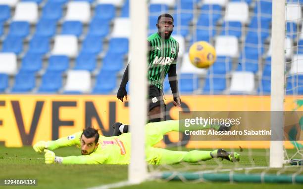 Jeremie Boga of Sassuolo scores his sides 1st goal past Mattia Perin of Genoa during the Serie A match between US Sassuolo and Genoa CFC at Mapei...