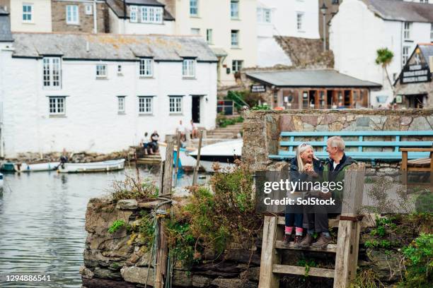 a cute couple - polperro cornwall stock pictures, royalty-free photos & images