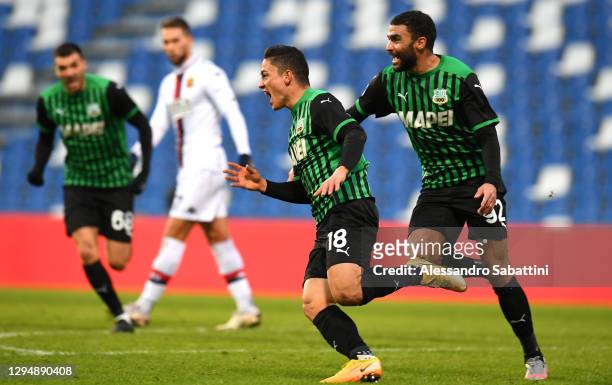 Giacomo Raspadori of Sassuolo celebrates after scoring their team's second goal with Gregoire Defrel of Sassuolo during the Serie A match between US...