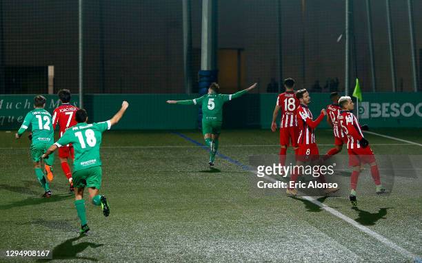 Adrian Jimenez Gomez of Cornella celebrates after scoring his sides first goal during the Copa del Rey match between Cornella and Atletico de Madrid...