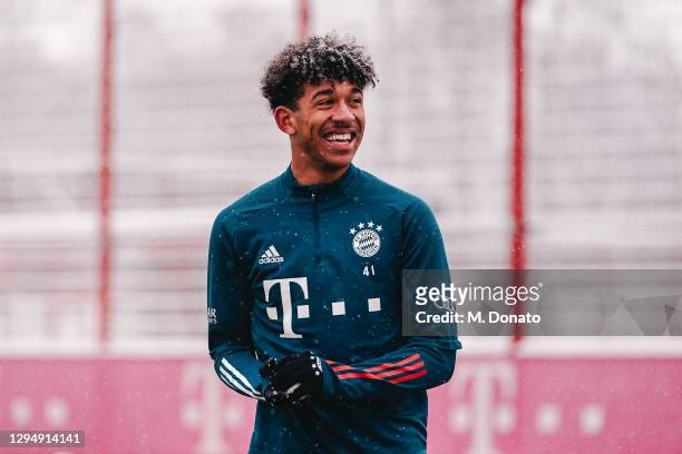 Chris Richards of Bayern Munich smiles during a FC Bayern Muenchen training session at Saebener Strasse training ground on January 06, 2021 in...