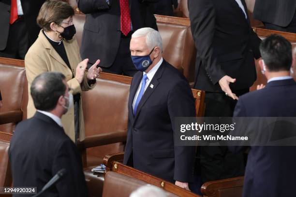 Vice President Mike Pence arrives to the House Chamber during a joint session of Congress on January 06, 2021 in Washington, DC. Congress held a...