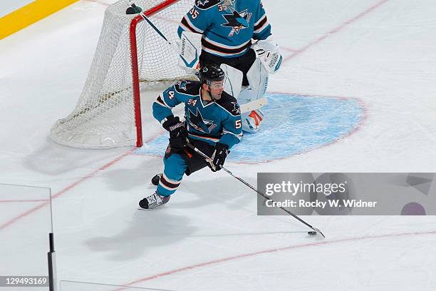 Defenseman Nick Petrecki of the San Jose Sharks skates the puck up the ice against the Phoenix Coyotes at the HP Pavilion on September 24, 2011 in...