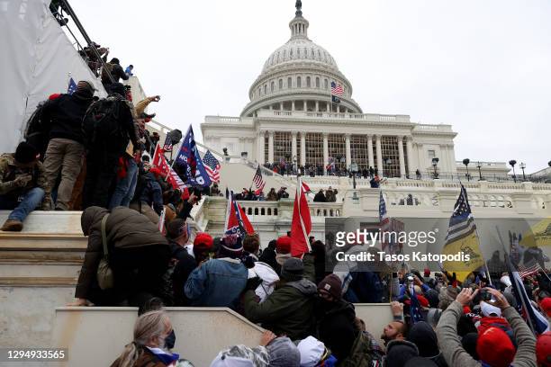 Protesters gather outside the U.S. Capitol Building on January 06, 2021 in Washington, DC. Pro-Trump protesters entered the U.S. Capitol building...