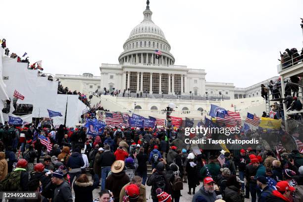 Protesters gather outside the U.S. Capitol Building on January 06, 2021 in Washington, DC. Pro-Trump protesters entered the U.S. Capitol building...