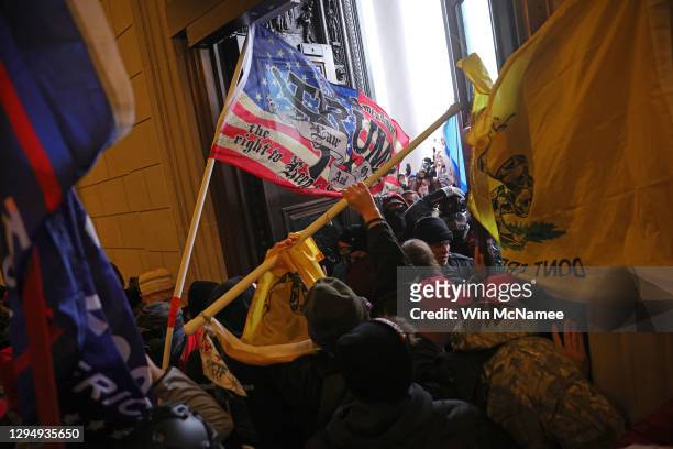 Protesters supporting U.S. President Donald Trump break into the U.S. Capitol on January 06, 2021 in Washington, DC. Congress held a joint session...