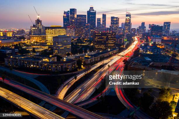 long exposure aerial of los angeles - downtown los angeles aerial stock pictures, royalty-free photos & images