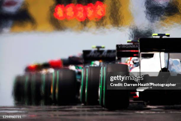 The Formula One grid of cars held by the red lights at the start of the 2010 Hungarian Grand Prix, Hungaroring, Budapest, Hungary, on the 01 August...