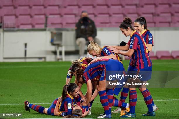 Alexia Putellas of FC Barcelona celebrates with teammates after scoring the opening goal during the Primera Iberdrola match between FC Barcelona and...