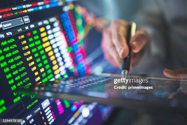 green bid-offer in financial stock market investment trading graph. candle stick graph chart. currency exchange rates. bullish point trend after coronavirus crisis - bid offer stock pictures, royalty-free photos & images