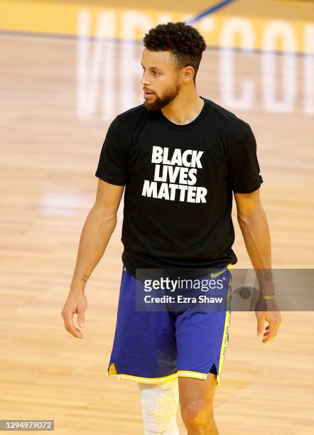 wearing steph curry black jersey