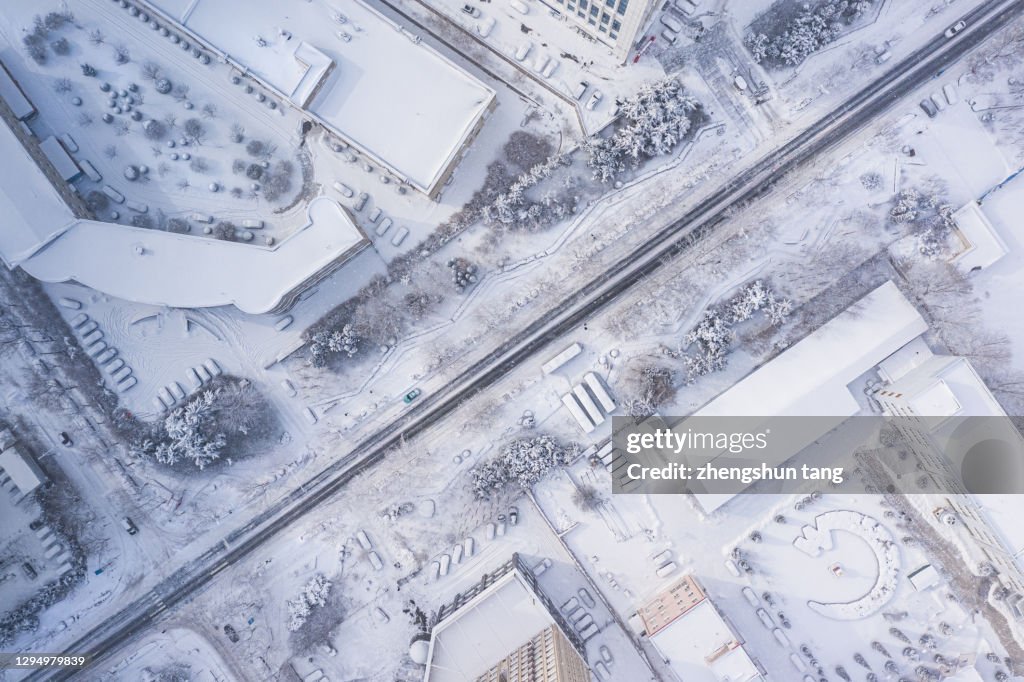 Directly above view of city street after snow