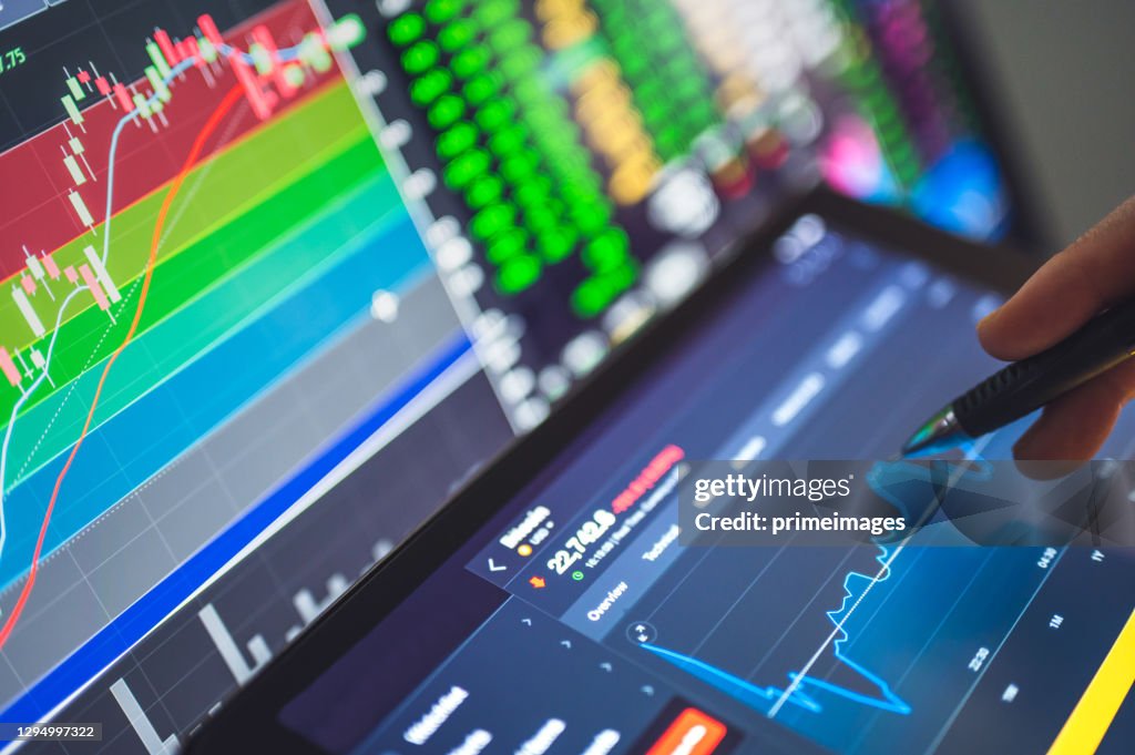 Trading investment analyzing data stock market in monitoring room background, forex trading graph, stock exchange trading online, financial investment concept
