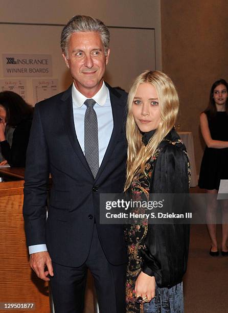 David Kratz and actress Mary-Kate Olsen attend The New York Academy of Art's 20th Annual Take Home a Nude benefit at Sotheby's on October 17, 2011 in...