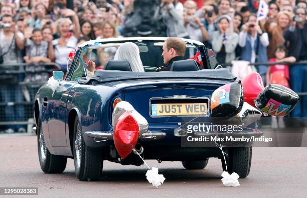 Prince William, Duke of Cambridge and Catherine, Duchess of Cambridge leave Buckingham Palace on route to Clarence House, driving Prince Charles,...
