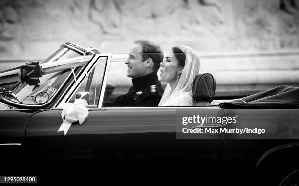 Prince William, Duke of Cambridge and Catherine, Duchess of Cambridge leave Buckingham Palace on route to Clarence House, driving Prince Charles,...