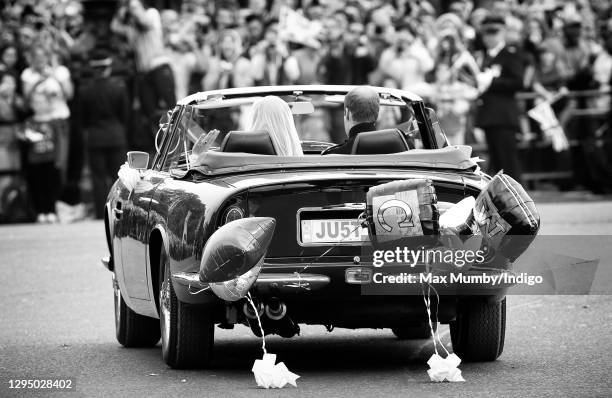 Prince William, Duke of Cambridge and Catherine, Duchess of Cambridge leave Buckingham Palace on route to Clarence House, driving Prince Charles,...