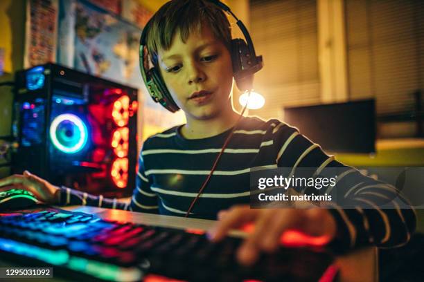 2,885 Boy On Computer Keyboard Stock Photos, High-Res Pictures, and ...