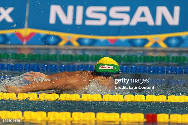 Swimmer Leonadro De Deus from Brazil competes in the 100 meter Buterfly final in the 2011 XVI Pan American Games at Scotiabank Aquatic Center on...