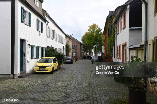 hauptstrasse in the historical center of alt-kaster, bedburg, north rhine-westphalia, germany - company town hall stock pictures, royalty-free photos & images