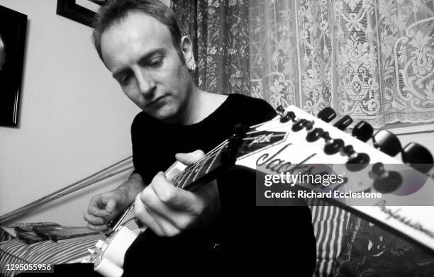 Phil Collen, English lead guitarist and member of rock band Def Leppard, 1996. He is playing a Jackson professional guitar.