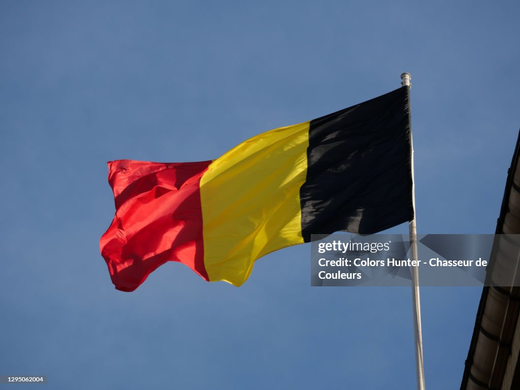 National Belgian flag on his mast
