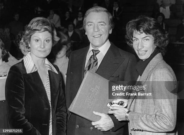British tennis player Virginia Wade stands with This Is Your Life television host Eamonn Andrews and newscaster Angela Rippon on 7th December 1977 at...
