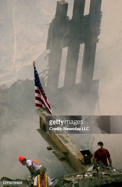 Rescue workers search for survivors at ground zero of the September 11 attack on the World Trade Center in Lower Manhattan, New York on Sept. 13 2001.