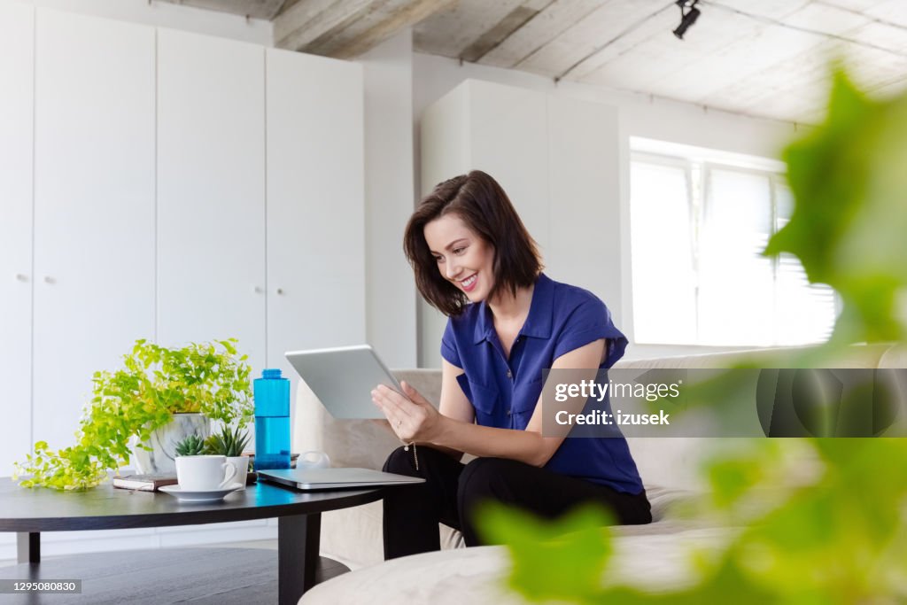 Businesswoman working at home