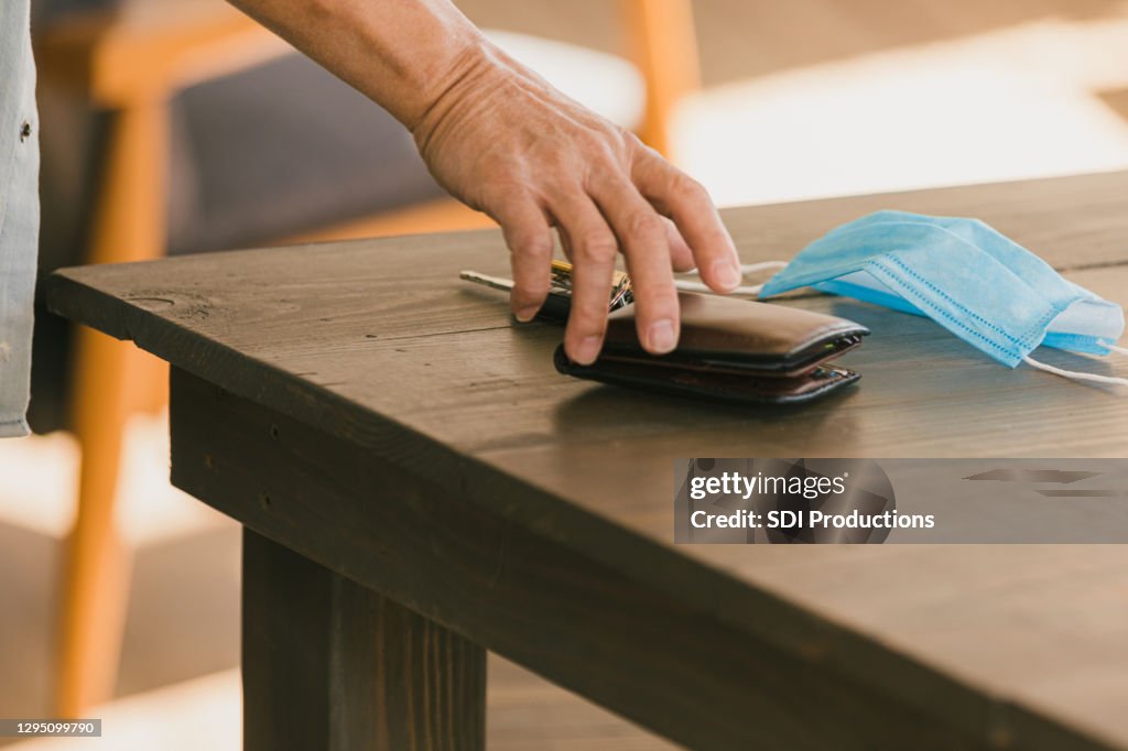Man prepares to run errands during COVID-19
