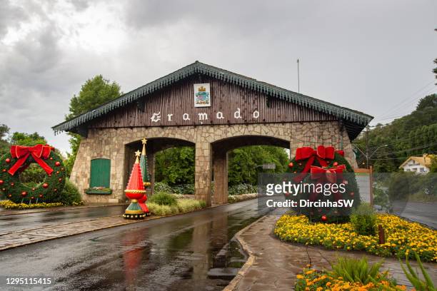 entrance portal to gramado, rio grande do sul, brazil. - rio grande do sul state stock pictures, royalty-free photos & images