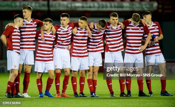 The Hamilton players look on during the penalty shoot out