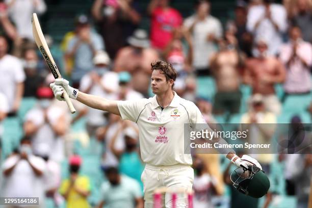 Steve Smith of Australia celebrates scoring a century during day two of the Third Test match in the series between Australia and India at Sydney...