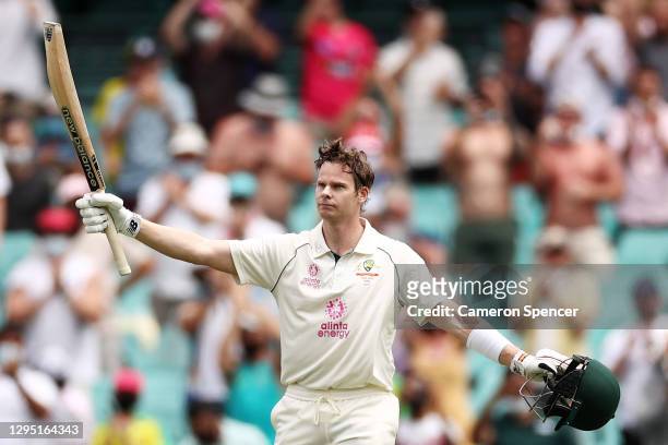 Steve Smith of Australia celebrates scoring a century during day two of the Third Test match in the series between Australia and India at Sydney...