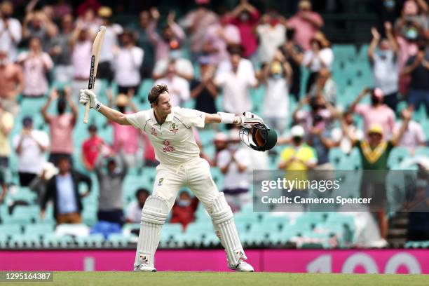 Steve Smith of Australia celebrates scoring a century during day two of the Third Test match in the series between Australia and India at Sydney...