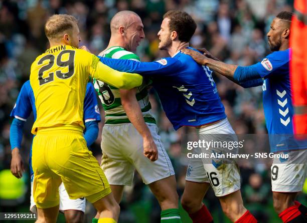 V RANGERS.CELTIC PARK - GLASGOW .Celtic goalkeeper Scott Bain comes between Scott Brown and Andy Halliday