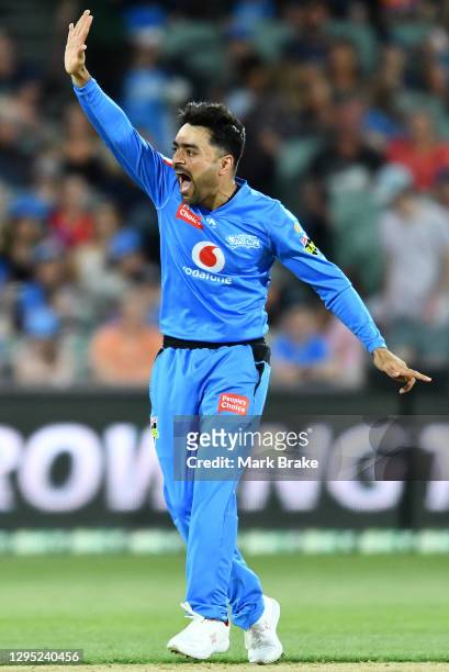 Rashid Khan of the Strikers appeals for lbw against Jack Prestwidge of the Renegades during the Big Bash League match between the Adelaide Strikers...