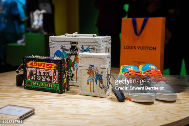 General view of displayed Vuitton Petite Malle bags, LV Trainer News  Photo - Getty Images