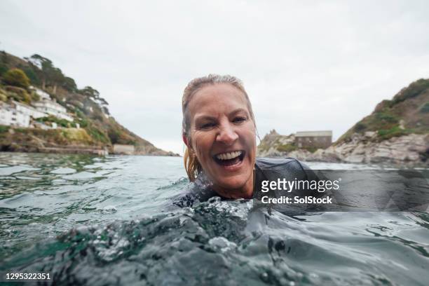 going with the flow - open water swimming stock pictures, royalty-free photos & images