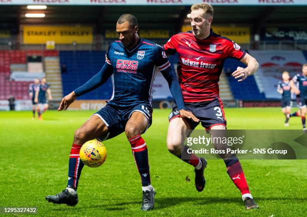 Vs DUNDEE.GLOBAL ENERGY STADIUM.Ross County's David Ngog and Kevin Holt in action.