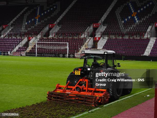 V HIBERNIAN.Hearts begin working on their pitch straight after full time ahead of next season