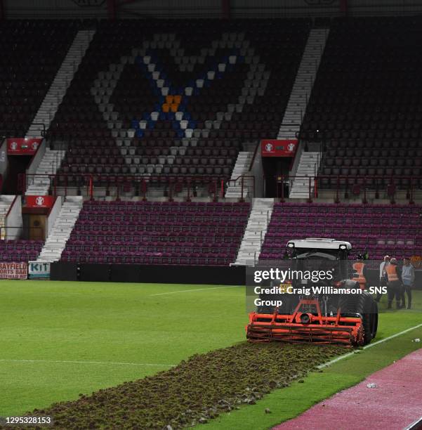 V HIBERNIAN.Hearts begin working on their pitch straight after full time ahead of next season