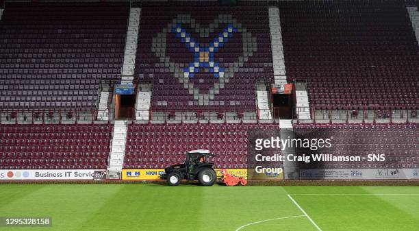 V HIBERNIAN.Hearts begin working on their pitch straight after full time ahead of next season