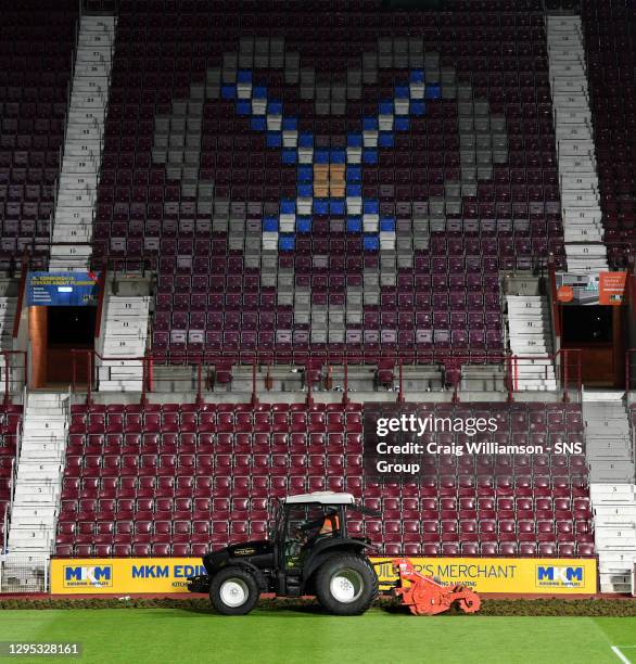 V HIBERNIAN.Hearts begin working on their pitch straight after full time ahead of next season